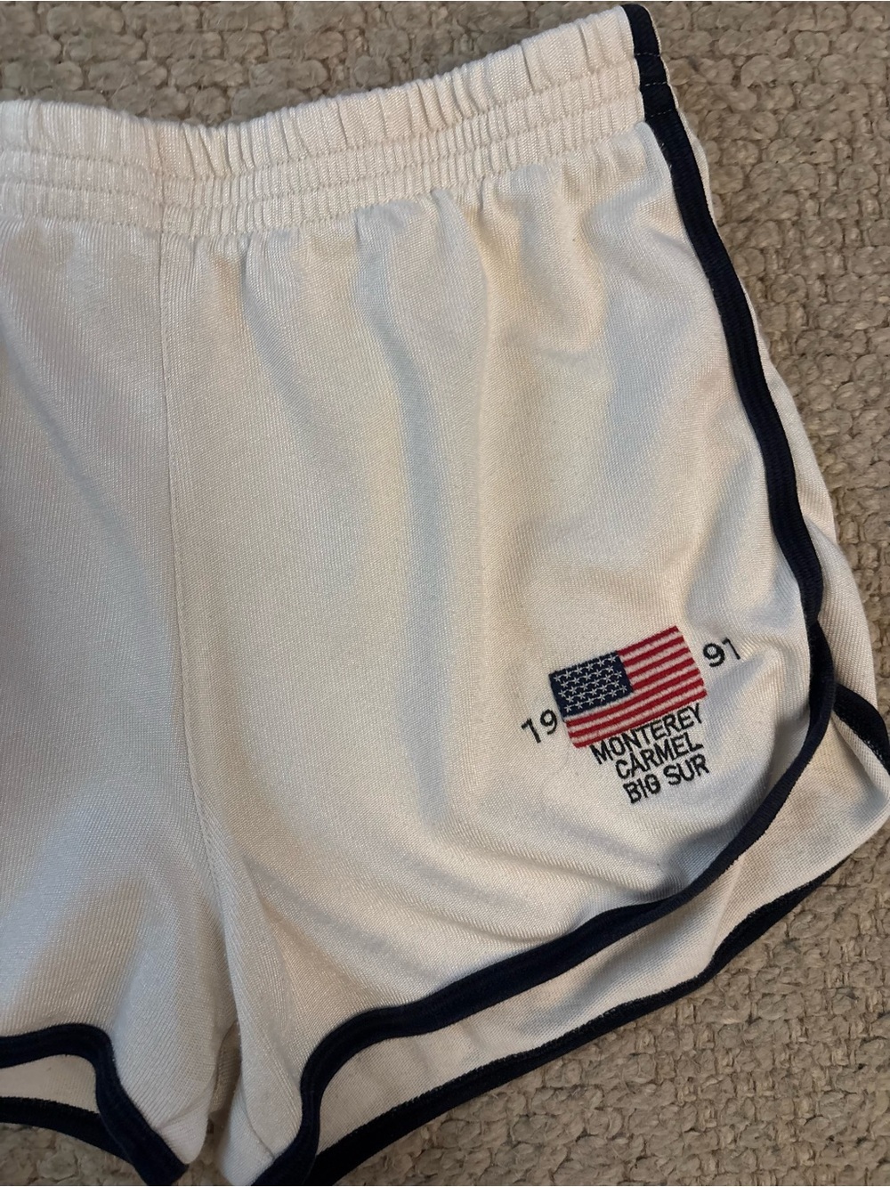 Brandy Melville White Athletic Shorts with Navy Trim and Flag Patch - Picture 4 of 4